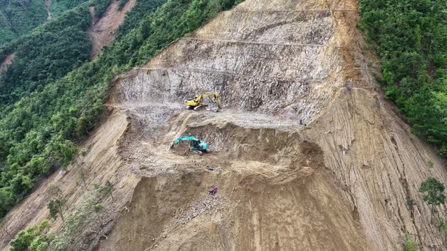 Machinery Clearing Steep Hillside