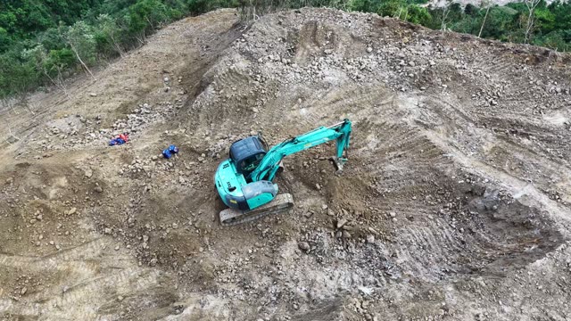 Excavator Working Mountain Slope