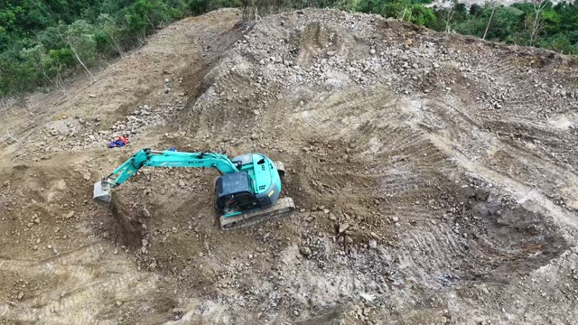 Excavators Clearing Mountain Road Path