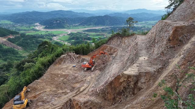 Excavator Above Wide Valley Panorama