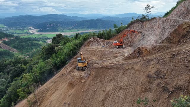 Excavators Above Green Valley View