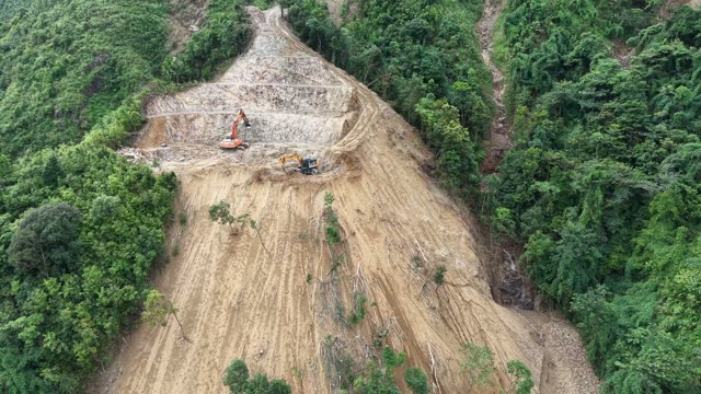 Truck On Curved Mountain Highway