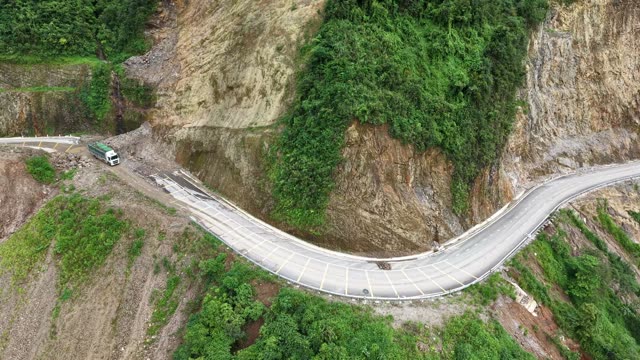 Two Excavators On Rocky Slope