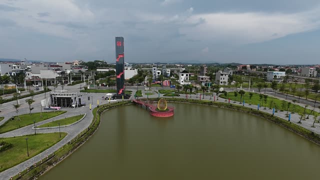 Drone Over Park Lake And Tower