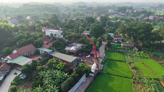 Village Rooftops And Rice Fields