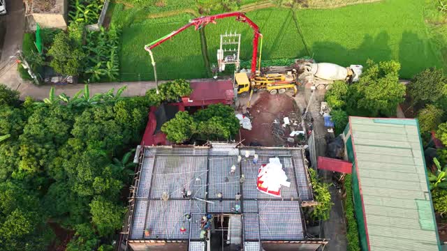 Aerial Rooftop Pour Workers