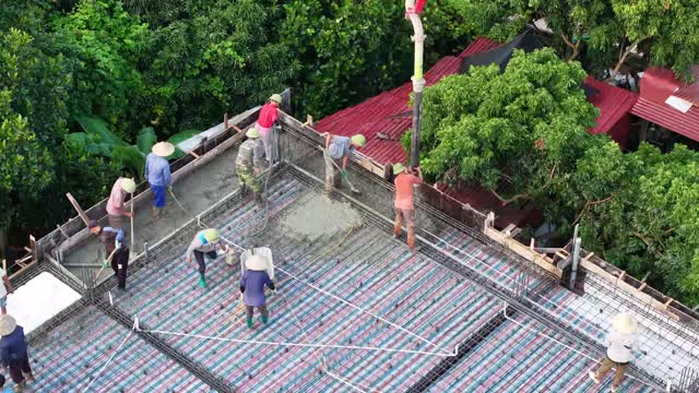 Overhead Workers Pouring Concrete