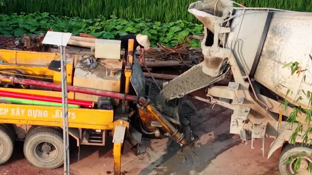 Mixer Chute Pouring Wet Concrete