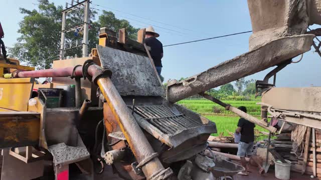 Pump Chute Beside Rice Field