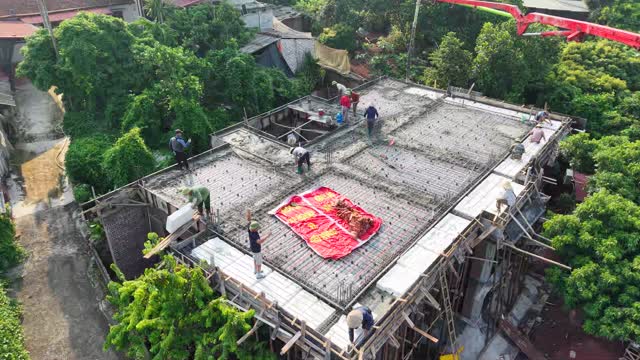 Workers Pouring Roof Slab