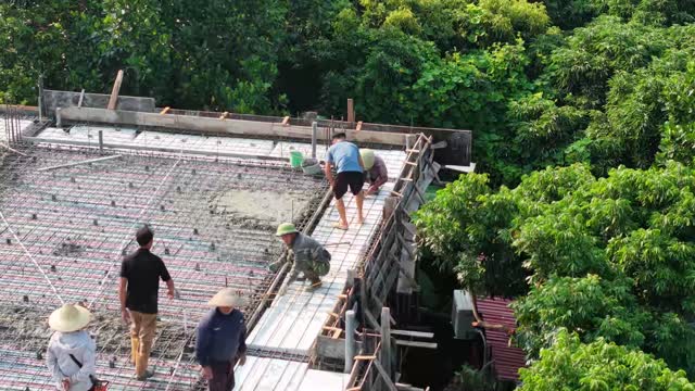 Crew Working Roof Perimeter