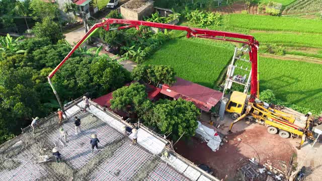 Aerial Pump Over Village House