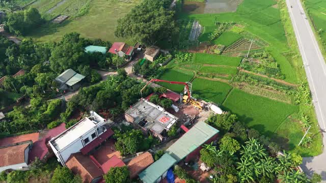 Aerial Village House Construction