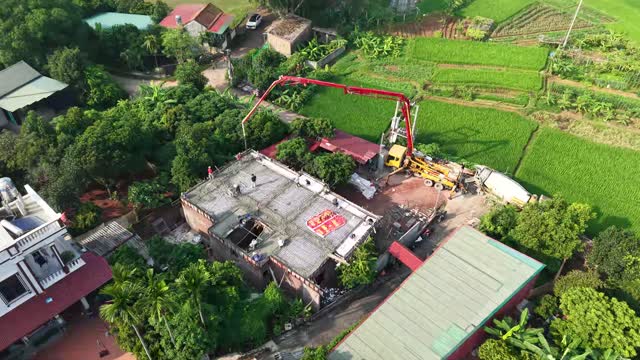 Concrete Pump Over Rooftop