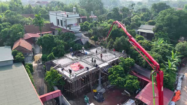 Red Pump Boom Rooftop Pour
