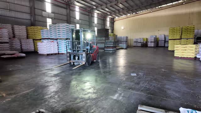 Forklift In Feed Warehouse