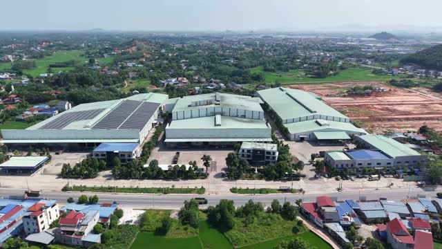 Aerial Industrial Complex Among Fields