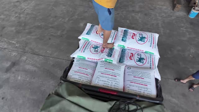 Stacked Pig Feed Bags