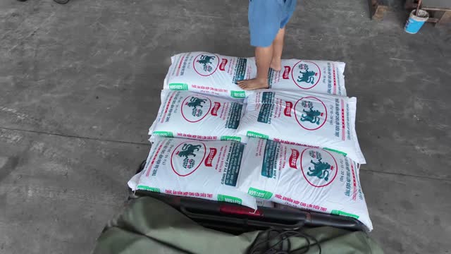 Animal Feed Sacks On Cart