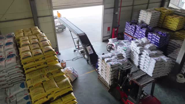 Feed Bags Loading Warehouse