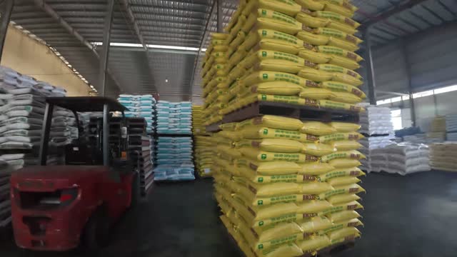 Forklift Stacking Feed Sacks