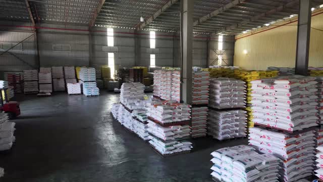 Warehouse Full Of Stacked Sacks