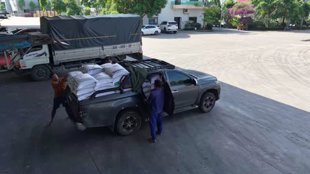 Aerial Loading Feed Sacks Pickup