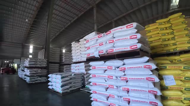Stacked Sacks In Storage Warehouse