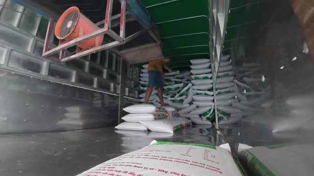 Feed Sacks Inside Delivery Truck