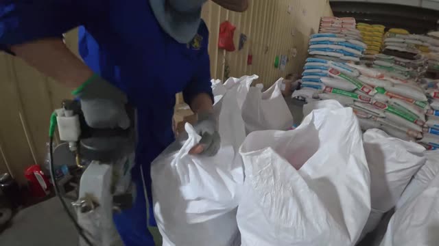 Sewing Animal Feed Sacks