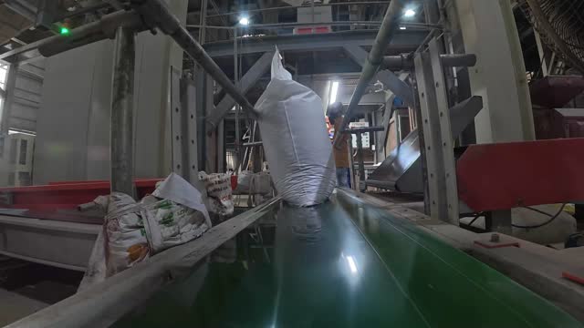 Feed Bag On Mill Conveyor
