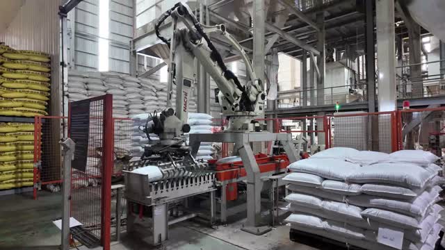 Robotic Arm Palletizing Feed Sacks