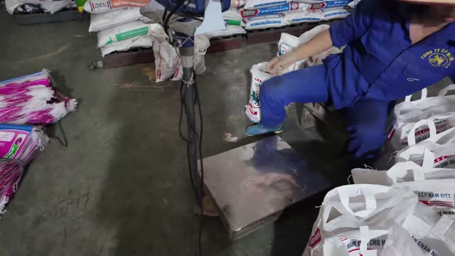 Packing Livestock Feed Bags