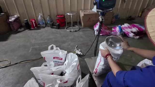 Weighing And Bagging Feed