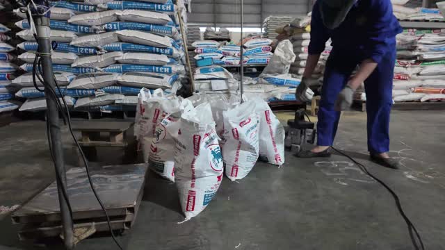 Packing Feed Sacks Warehouse