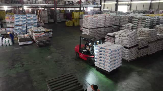 Forklift Loading Feed Warehouse