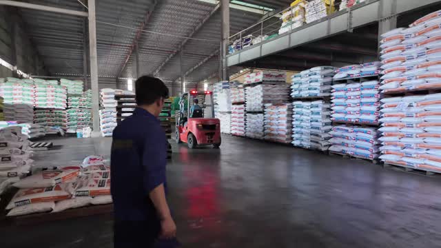 Forklift In Feed Warehouse