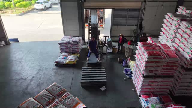 Feed Sacks At Warehouse Dock