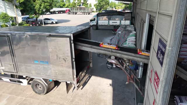 Trucks At Warehouse Loading Dock