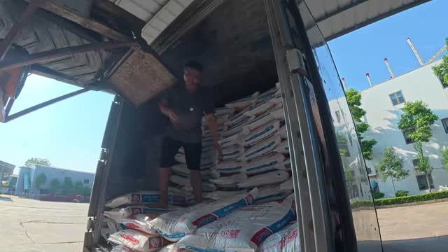Worker On Truck Load