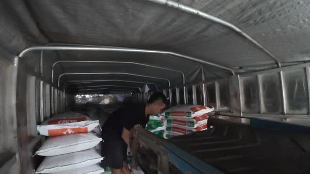 Loading Sacks Inside Truck Bed