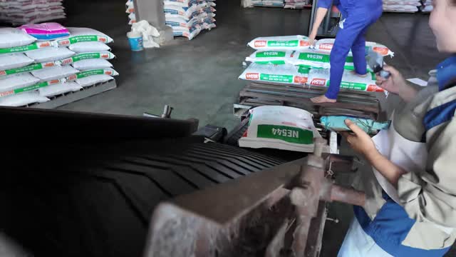 Feed Sacks On Conveyor Belt