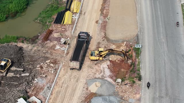 Truck And Excavator Roadworks