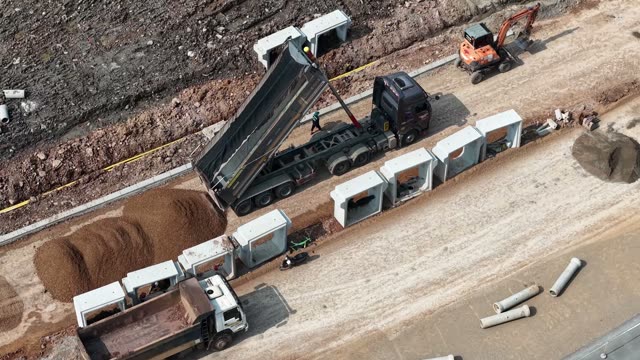 Dump Truck And Excavator Aerial
