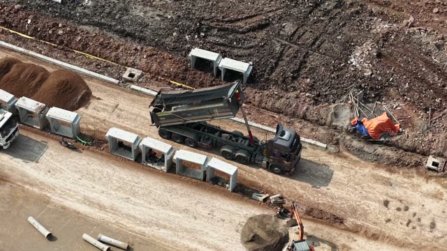 Dump Truck Tipping At Site