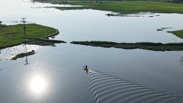 Boat Crossing Sunlit Lagoon