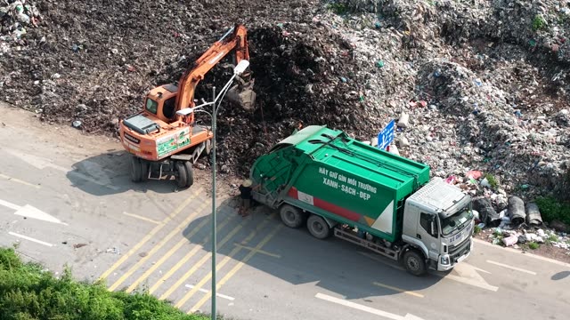 Garbage Truck At Dump