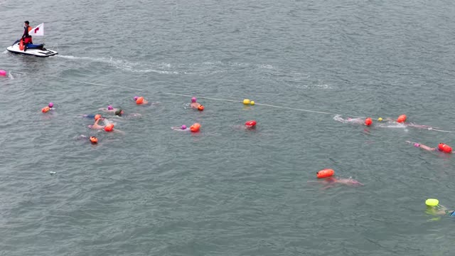 Jet Ski Escorts Swimmers