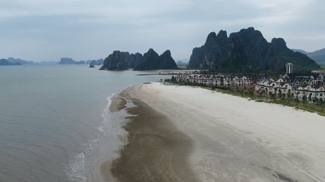 Sandbar Beach And Karst Peaks
