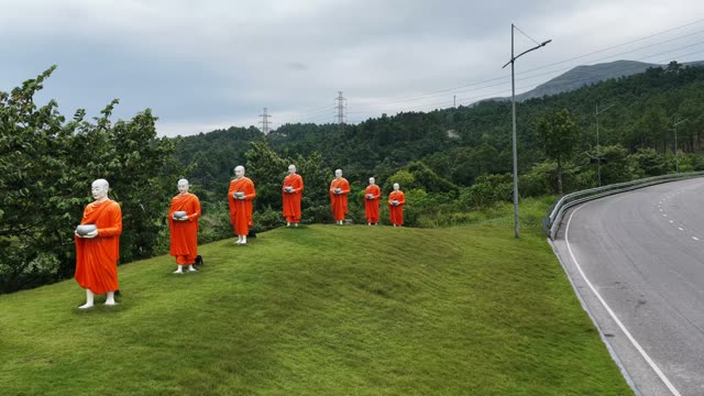 Monk Statues Roadside Hill